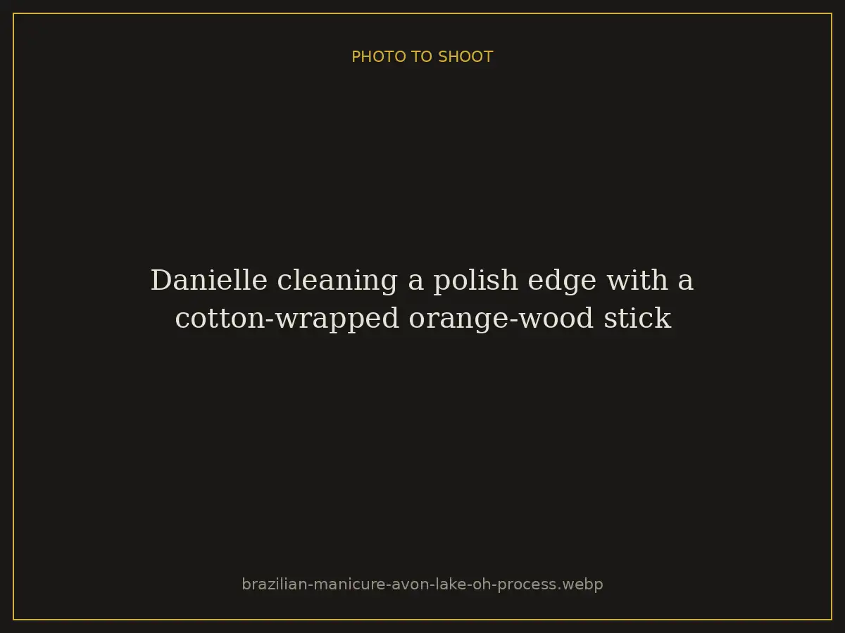 Danielle cleaning a polish edge with a cotton-wrapped orange-wood stick at Brazilian Nails By Danielle in Westlake, Ohio, a short drive from Avon Lake