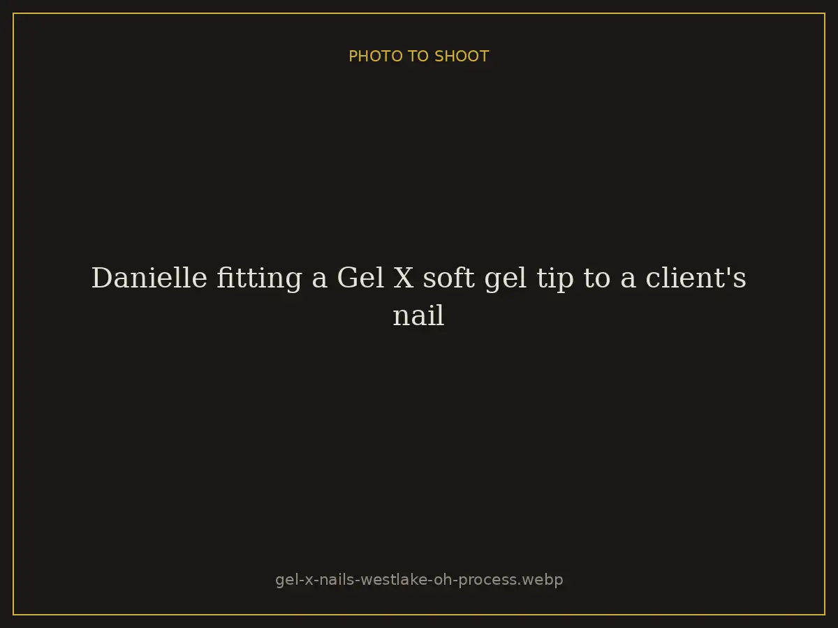 Danielle fitting a Gel X soft gel tip to a client's nail at Brazilian Nails By Danielle in Westlake, Ohio